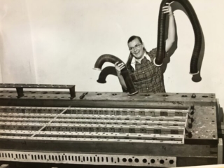 Woman (identity unknown) removing windchest from organ (ca.1973)